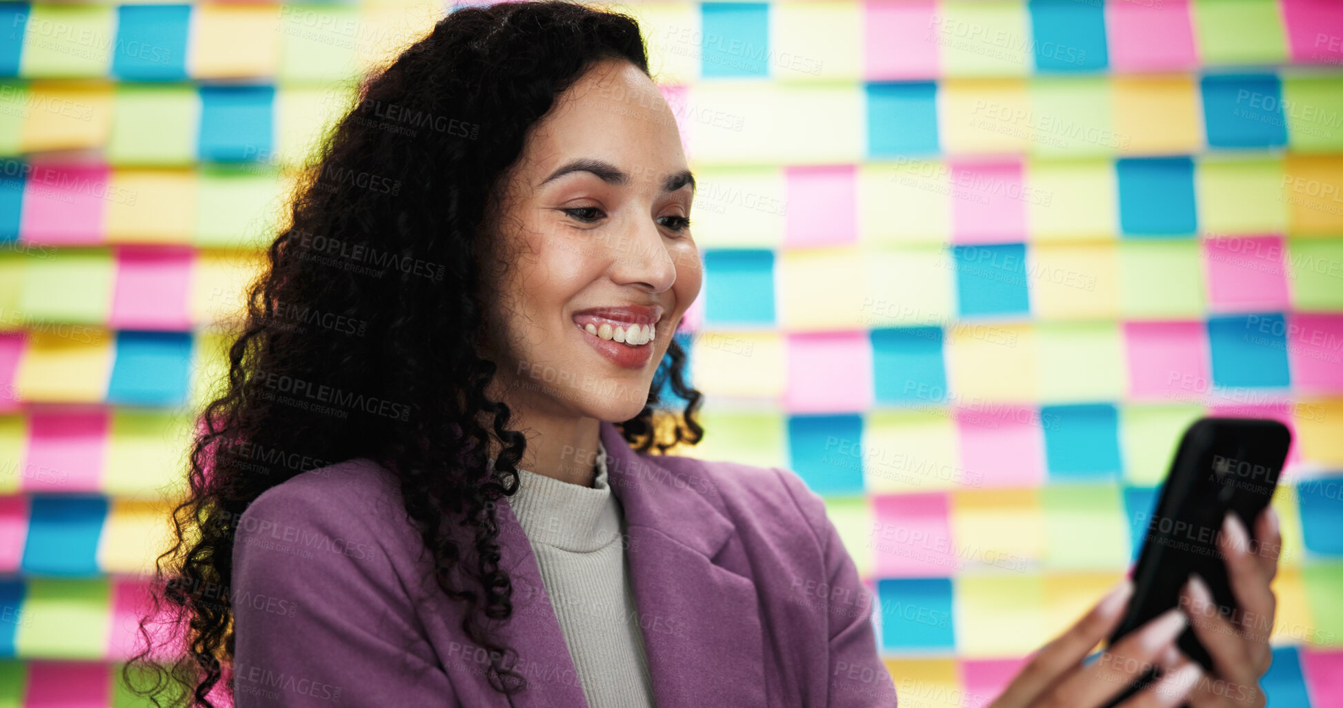 Buy stock photo Business woman, smartphone and happy with notes in office, reading or notification with problem solving. Person, smile and phone by wall, board and contact with mobile app for deal at creative agency