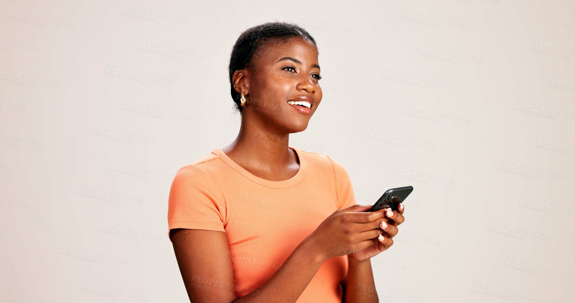 Buy stock photo Studio, happy black woman and thinking with mobile for communication, chat or text on social media. Daydreaming, smile and girl with ideas or phone for app question and comment by white background