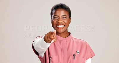 Buy stock photo Black woman, doctor and pointing to you with portrait, choice or call to action for medical career on white studio background. Person, nurse and happy with decision, feedback and healthcare services