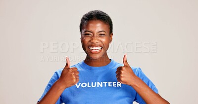 Buy stock photo Happy, black woman and volunteer with thumbs up for charity or community service on a white studio background. Portrait, African or female person with smile, like emoji or yes sign for NGO outreach