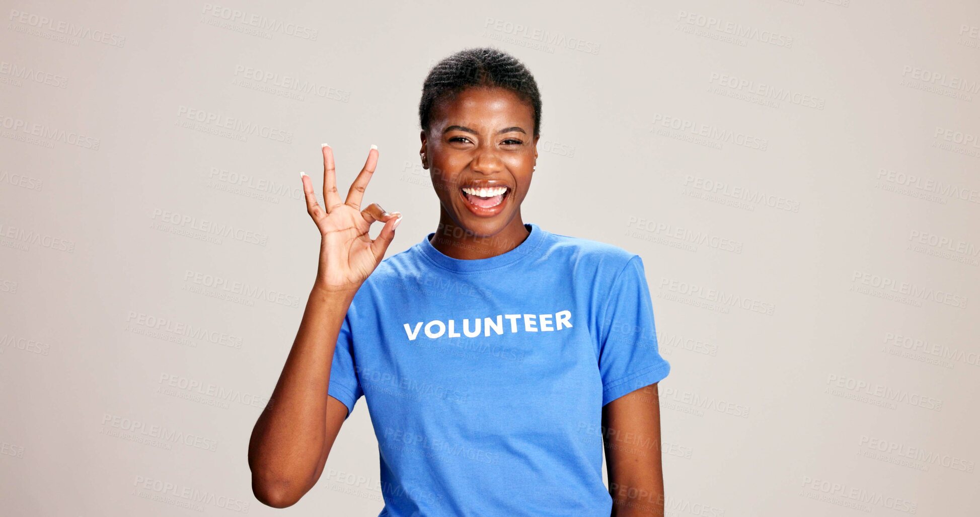 Buy stock photo OK, sign and volunteer woman with portrait on studio background for NGO project success and approval. Black person, happy and perfect emoji on mockup space for charity support and community service