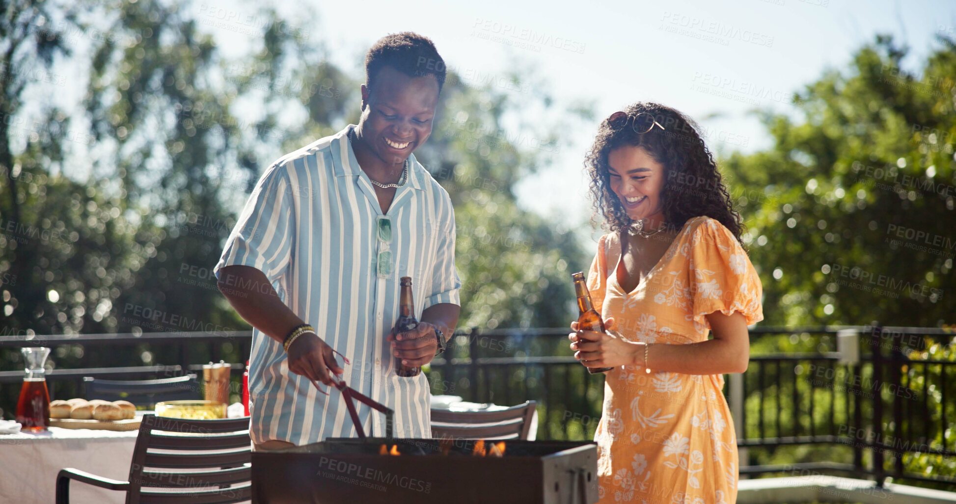 Buy stock photo Cooking, drinks and couple of friends outdoor for social gathering, laughing and funny joke at reunion event. New years celebration, woman and man with bbq on terrace for support, bonding and holiday
