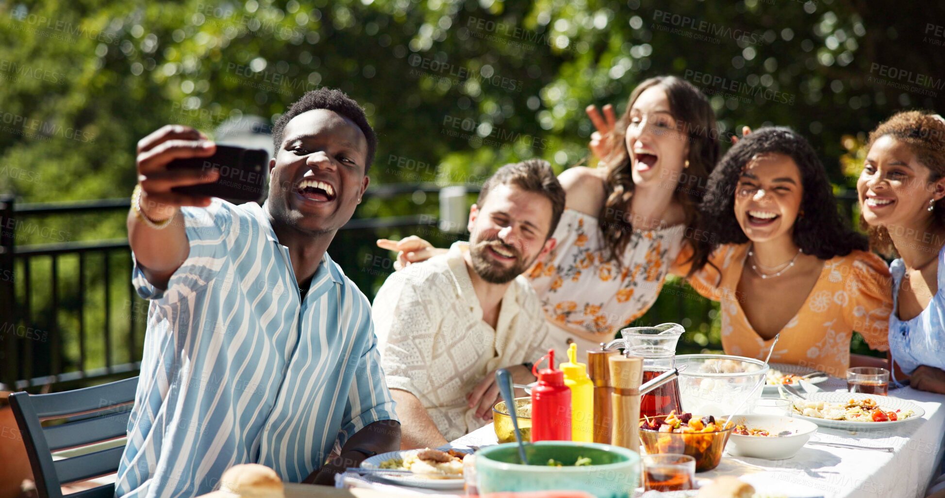 Buy stock photo Friends, lunch and smile with selfie outdoor for new year celebration, social gathering or profile picture update. Happy memory, diversity people or photography on terrace with food for festive party