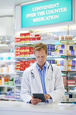 Buy stock photo Pharmacist, tablet and inventory for stock, checking and medicine in drugstore, chemist or services. Male person, doctor and pharmaceuticals in store for prescription, pills for information or advice