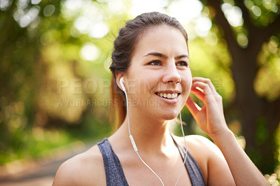 Buy stock photo Runner, exercise and woman with music at park for cardio break, running podcast or relax with audio. Athlete, thinking and earphones in nature for workout, listening to song or streaming subscription