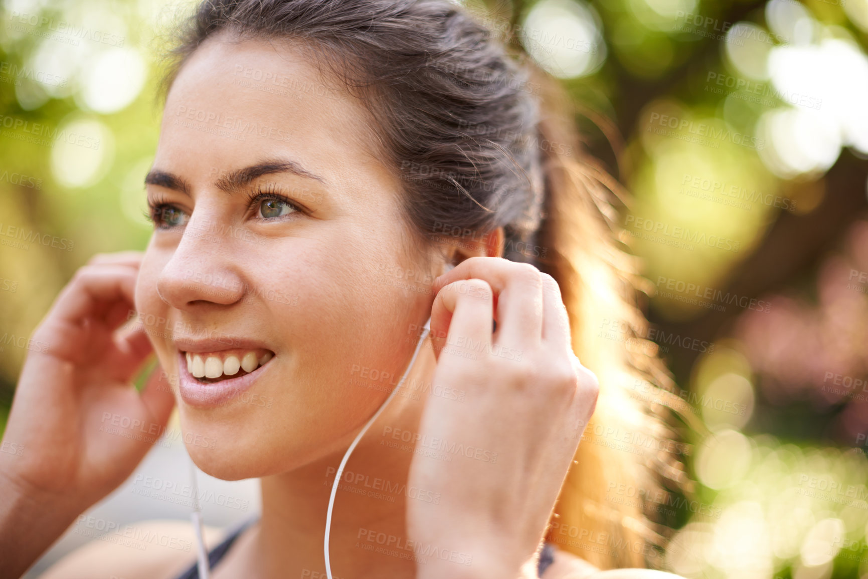 Buy stock photo Happy, listening and woman with earphones, fitness and streaming of music for motivation and runner. Outdoor, training and person with sportswear for exercise, audio and practice for marathon