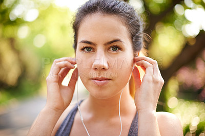 Buy stock photo Portrait, serious and woman with earphones, fitness and streaming of music for motivation and runner. Outdoor, training and person with sportswear for exercise, listening and practice for marathon