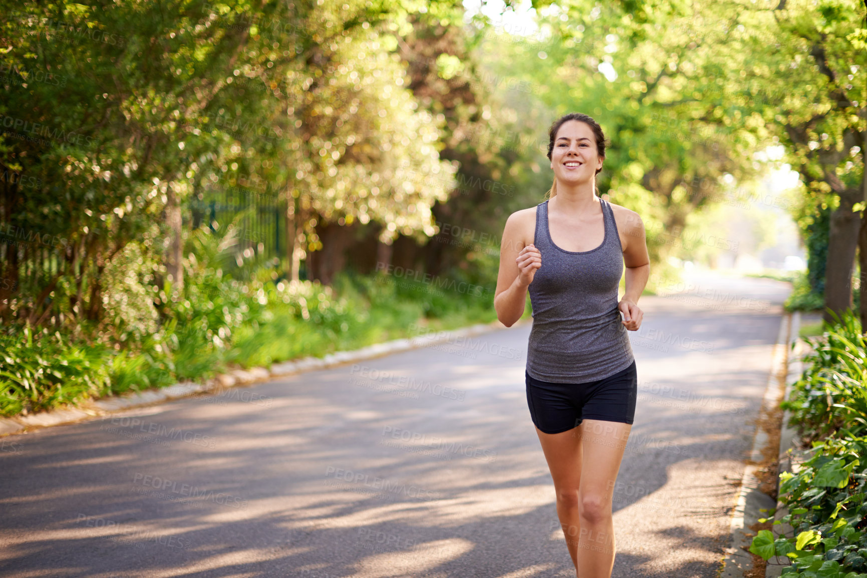 Buy stock photo Running, fitness and woman with training, energy and nature with challenge, wellness and endurance. Healthy person, outdoor or athlete with practice, cardio or workout with sports or runner in street