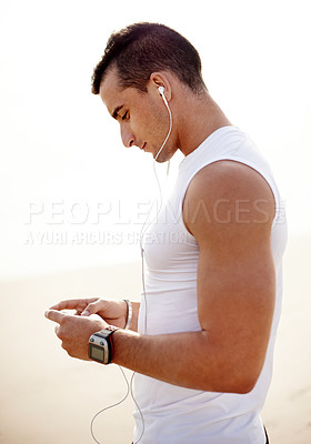 Buy stock photo Earphones, phone and man outdoor for fitness listening to music, podcast or radio for run. Cellphone, sports and male athlete with audio tech for cardio workout, exercise or training playlist.