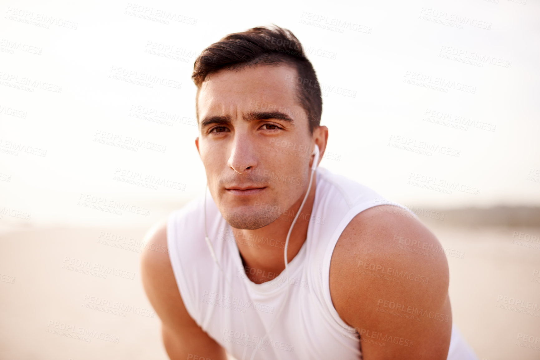 Buy stock photo Earphones, serious and portrait of man with fitness outdoor listening to music, podcast or radio for run. Health, sports and athlete with audio tech for cardio workout, exercise or training playlist.