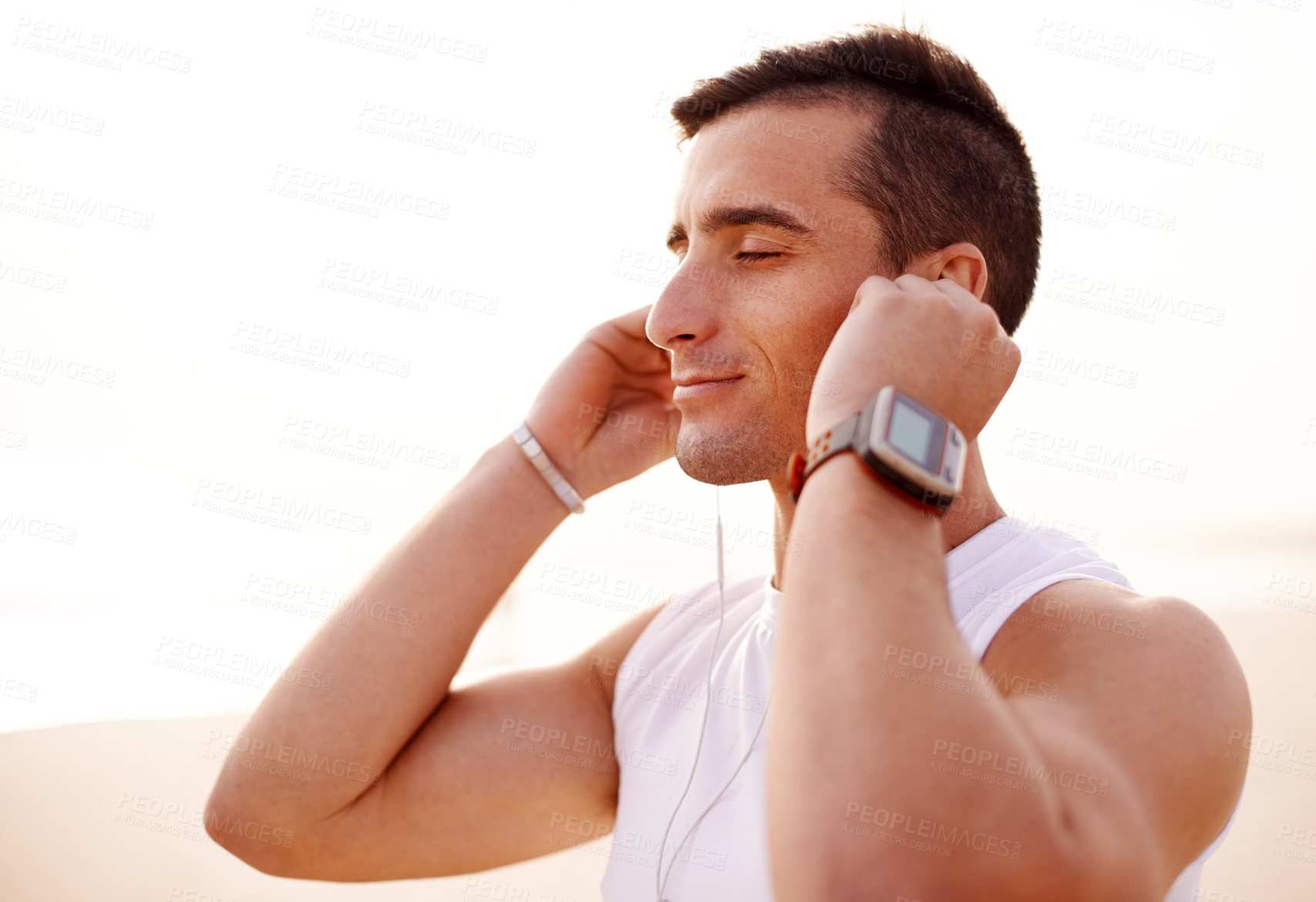 Buy stock photo Earphones, runner and relax with man in park for fitness podcast, workout and listening. Wellness audiobook, training and health with person in nature for marathon practice, music and cardio