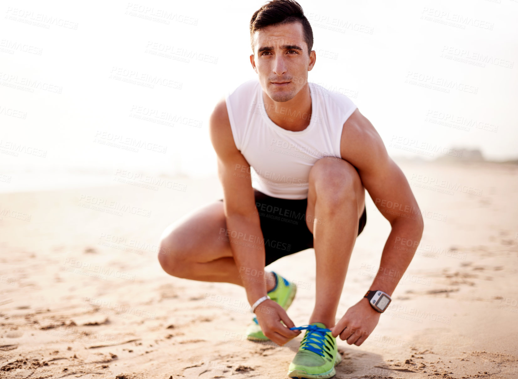 Buy stock photo Shoes, laces and man on beach with fitness, outdoor workout and commitment to running in morning. Thinking, getting ready and runner at ocean with health, wellness and sneakers for exercise in nature