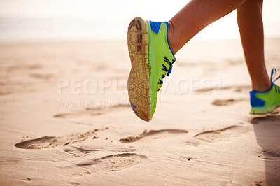 Buy stock photo Person, sand and feet running on beach for fitness, outdoor cardio and sports workout for exercise. Wellness, sneakers and athlete for training in nature, ocean and performance on tropical holiday