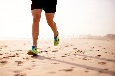 Buy stock photo Fitness, running and legs of person on beach for workout, marathon training or endurance challenge. Sports, exercise and athlete on sand for morning cardio, performance or physical activity in Sydney