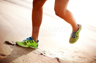 Buy stock photo Man, beach sand and legs running for fitness, outdoor cardio and sports workout for exercise. Male person, sneakers and athlete for training in nature, ocean and performance on tropical vacation