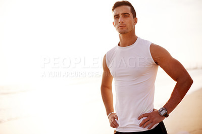 Buy stock photo Portrait, beach and man with fitness, training and confidence with wellness, pride and challenge. Face, seaside and runner with endurance, healthy person and serious with practice, strong and workout