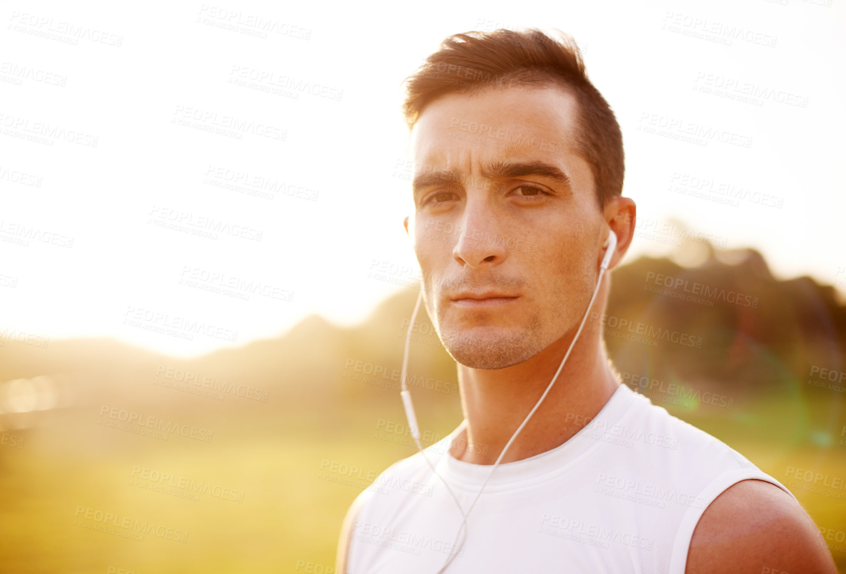 Buy stock photo Earphones, health and portrait of man in park for fitness podcast, workout and running. Wellness audiobook, training and runner with person in nature for marathon practice, music and cardio.
