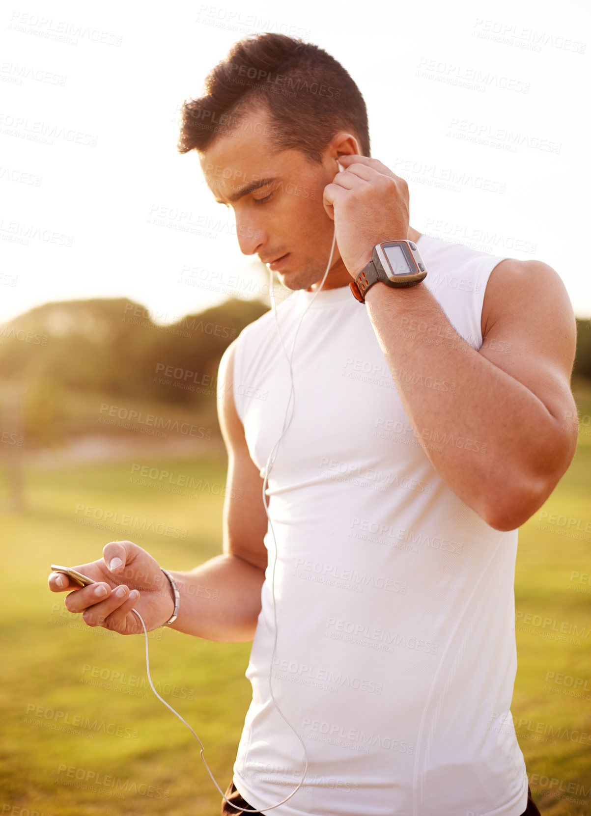 Buy stock photo Fitness, earphones and man in nature for running exercise with endurance, speed and race training. Challenge, sports and male athlete with audio tech for music or podcast with outdoor cardio workout.