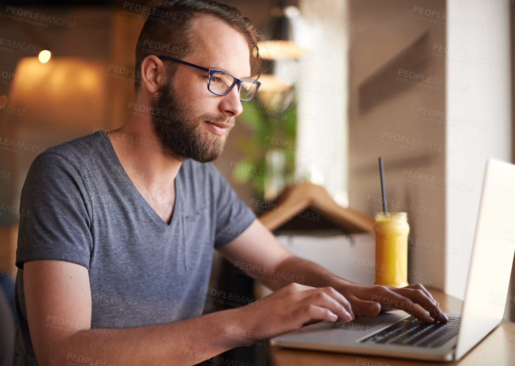 Buy stock photo Laptop, typing and man in coffee shop, digital nomad and remote work for social media marketing. Computer, freelancer and customer in cafe for writing blog, sponsorship email and campaign online