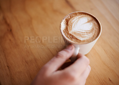 Buy stock photo Latte art, hand and drink with person in coffee shop for morning, espresso and caffeine fix. Mocha, beverage and hospitality with customer in cafe restaurant for brunch break, mockup space or closeup