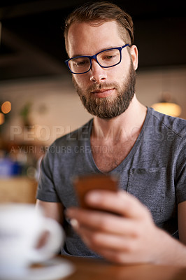 Buy stock photo Man, phone and reading text in coffee shop for project, networking and internet website research for inspiration. Cafe, app and freelance editor with email for remote work, communication or planning