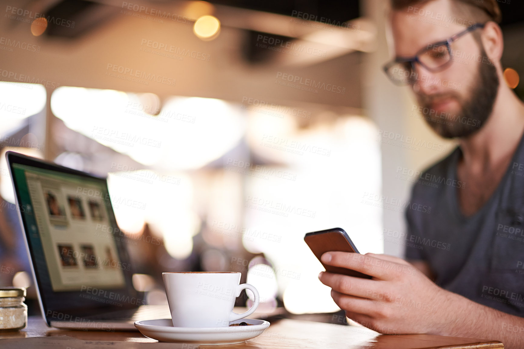 Buy stock photo Hand, phone and man in coffee shop networking on social media, mobile app or internet website. Laptop, technology and freelance editor reading email for remote work, communication or feedback in cafe