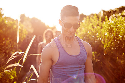 Buy stock photo Adventure, exercise or hiking and man in mountains with friends for bonding, exploration or journey. Fitness, health and wellness with group of people walking outdoor in nature for summer holiday