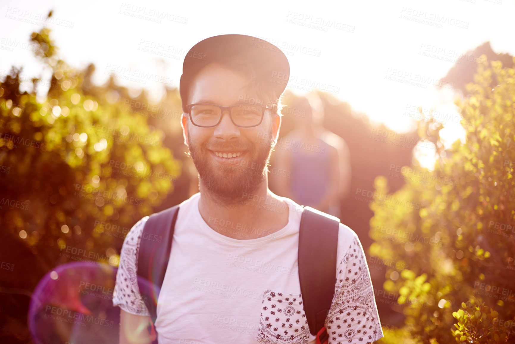 Buy stock photo Portrait, man and smile with hiking on mountains for bush adventure, travel journey and exploration. Happy, male backpacker and trekking in nature, getaway trip and summer vacation with destination 