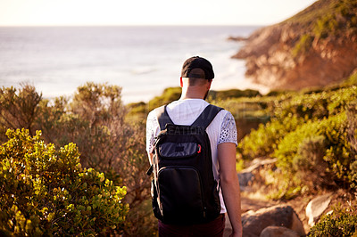 Buy stock photo Walking, travel and back with man in nature for hiking, adventure and summer vacation. Trekking, tour guide and eco tourism with person outdoors for environment, wildlife reserve and backpacking