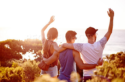 Buy stock photo Celebration, beach and people on vacation, view and waving for reunion in paradise, back and outdoor. Space, friends and embrace for relationship in nature, scenery and location for holiday in Greece