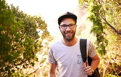 Buy stock photo Portrait, man and backpack on mountain outdoor of hiking adventure, travel journey and explore. Smile, male person and glasses with trekking getaway, sightseeing and vacation path of trip destination