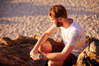 Buy stock photo Relax, thinking and travel with man at beach for summer vacation, reflection and tropical destination. Holiday, peace and vision with person on hill outdoor on coast for wellness, memory and paradise