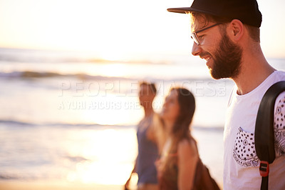 Buy stock photo Smile, man and walking on beach outdoor with travel, summer adventure and getaway. Happy, group of friends and ocean trip with holiday journey, tropical destination and bonding together for gathering