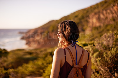 Buy stock photo Smile, woman and hiking on mountain outdoor for adventure view, travel journey and destination. Back, female person and backpacking getaway in nature, sightseeing and vacation exploration of location