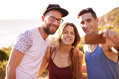 Buy stock photo Friends, selfie and sunset walk on mountain for countryside, travel or adventure to explore nature. Journey, group of people and memories with natural environment for hiker, hobby or bonding together