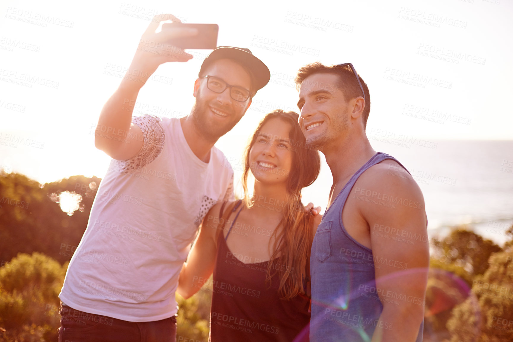 Buy stock photo Friends, group selfie and sunset walk on mountain for countryside, travel or adventure to explore nature. Vacation, people and memories with natural environment for hiker, hobby or bonding together