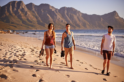 Buy stock photo Happy, people and walking on beach outdoor with travel reunion, summer adventure and getaway. Smile, friends and ocean trip with holiday journey, island destination and bonding together for gathering