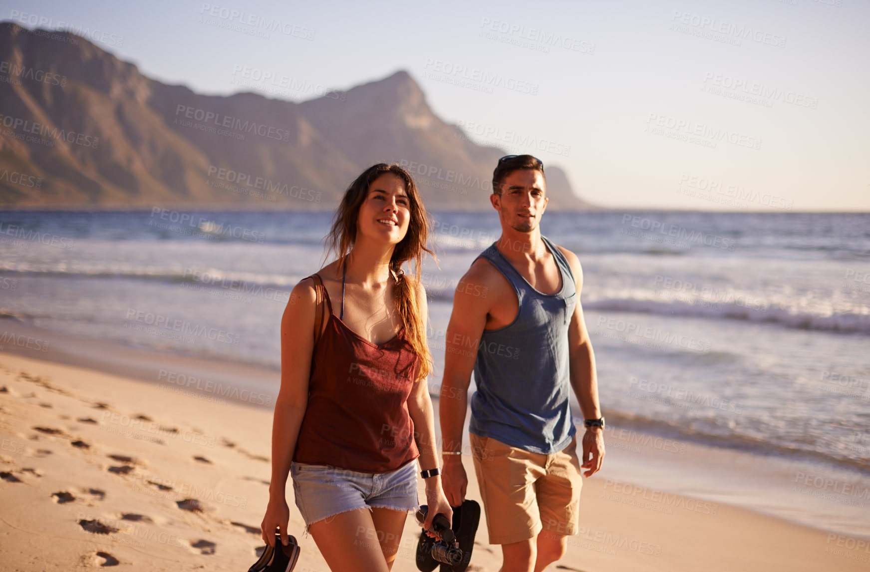 Buy stock photo Smile, couple and walking on beach outdoor with vacation travel, summer adventure and getaway. Happy, people and ocean with holiday journey, tropical destination and bonding together for relationship