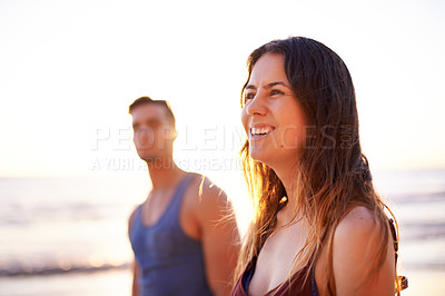 Buy stock photo Smile, woman and walking on beach outdoor with partner for travel, summer adventure and getaway. Happy, people and ocean for holiday journey, tropical destination and bonding together of relationship