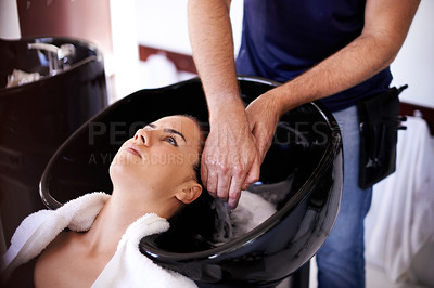 Buy stock photo Woman, hairdresser and washing in beauty salon with hands, basin or process for hygiene, cleaning and wellness. People, shampoo and shower for care with cosmetics for transformation, change or growth