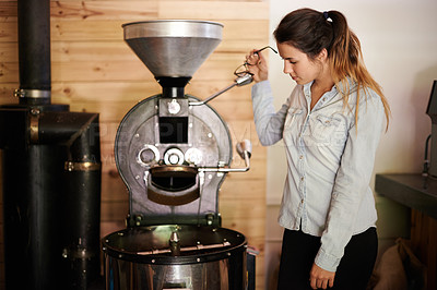Buy stock photo Coffee machine, process and roast with waitress woman in kitchen of cafe for brewing or hospitality. Caffeine, equipment and service with barista in restaurant for sale of fresh beverage shop