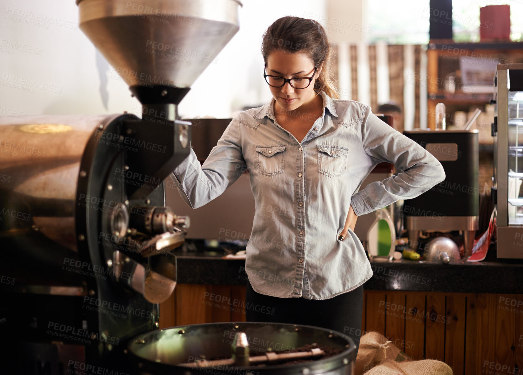 Buy stock photo Coffee machine, roast and service with barista woman in kitchen of cafe for brewing or hospitality. Caffeine, equipment and process with waitress in restaurant for retail sale of fresh beverage