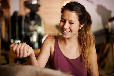 Buy stock photo Factory, fresh and woman with coffee beans, bag and inspection of harvest, cafe and small business. Production, sustainability and barista with grains for caffeine, quality assurance and process