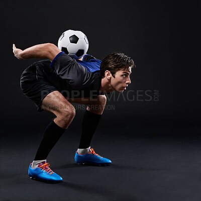 Buy stock photo Man, football and skill for fitness in studio for sports training with balance isolated on black background. Freestyle, talent and male athlete with control in soccer kit with exercise in Brazil.
