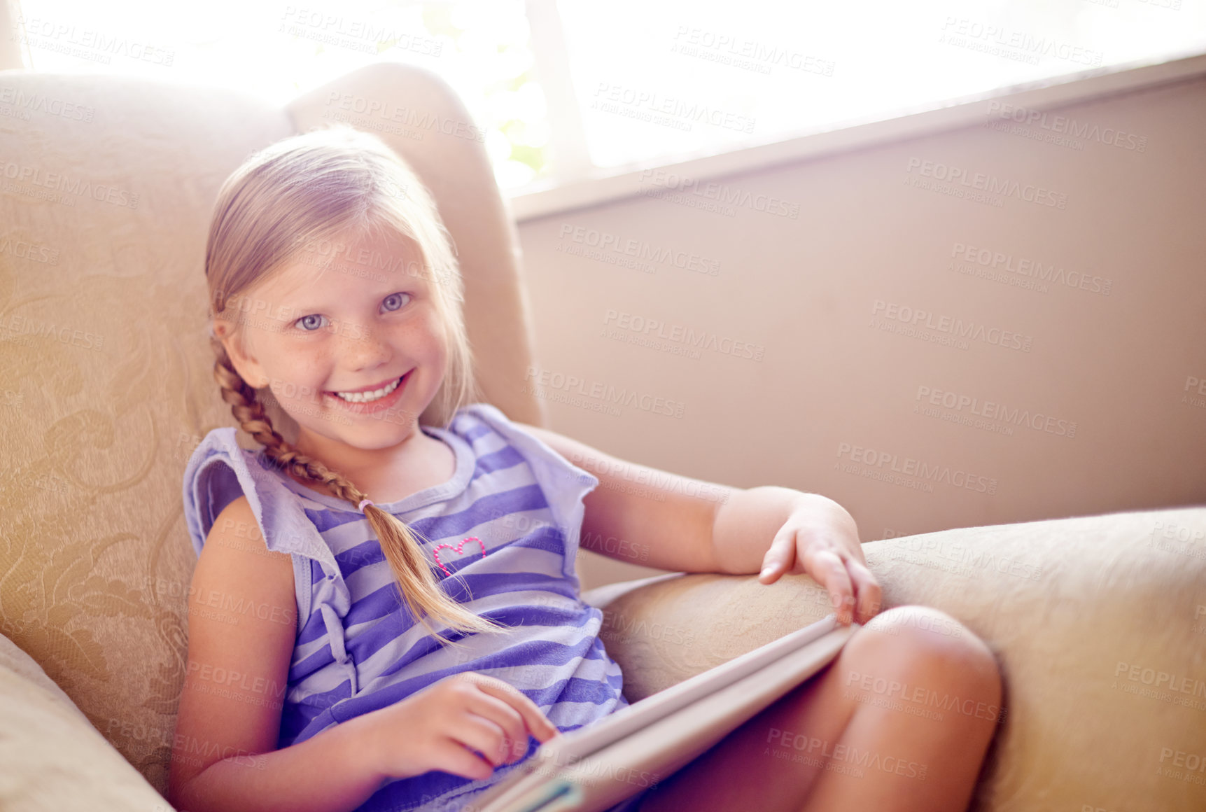 Buy stock photo Tablet, relax and portrait of child on sofa in home playing educational online game for learning on weekend. Happy, website and girl kid on technology watching movie on streaming app in living room.
