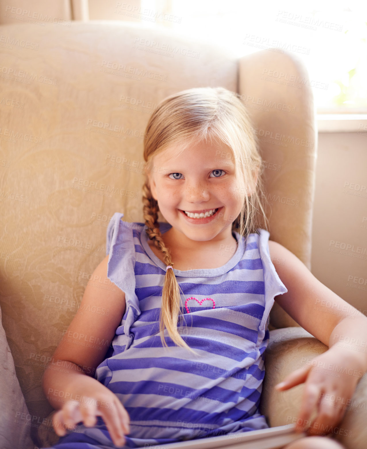 Buy stock photo Portrait, happy kid and tablet in home for learning, education app and streaming online in living room. Cute face, smile and girl with technology to relax with fantasy ebook for development in USA