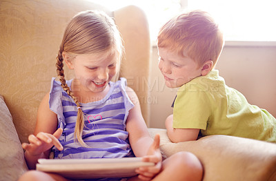 Buy stock photo Relax, family and children with tablet, couch and smile for conversation in home, love or siblings. House, brother and online with sister in lounge, boy and girl with tech for movies or streaming