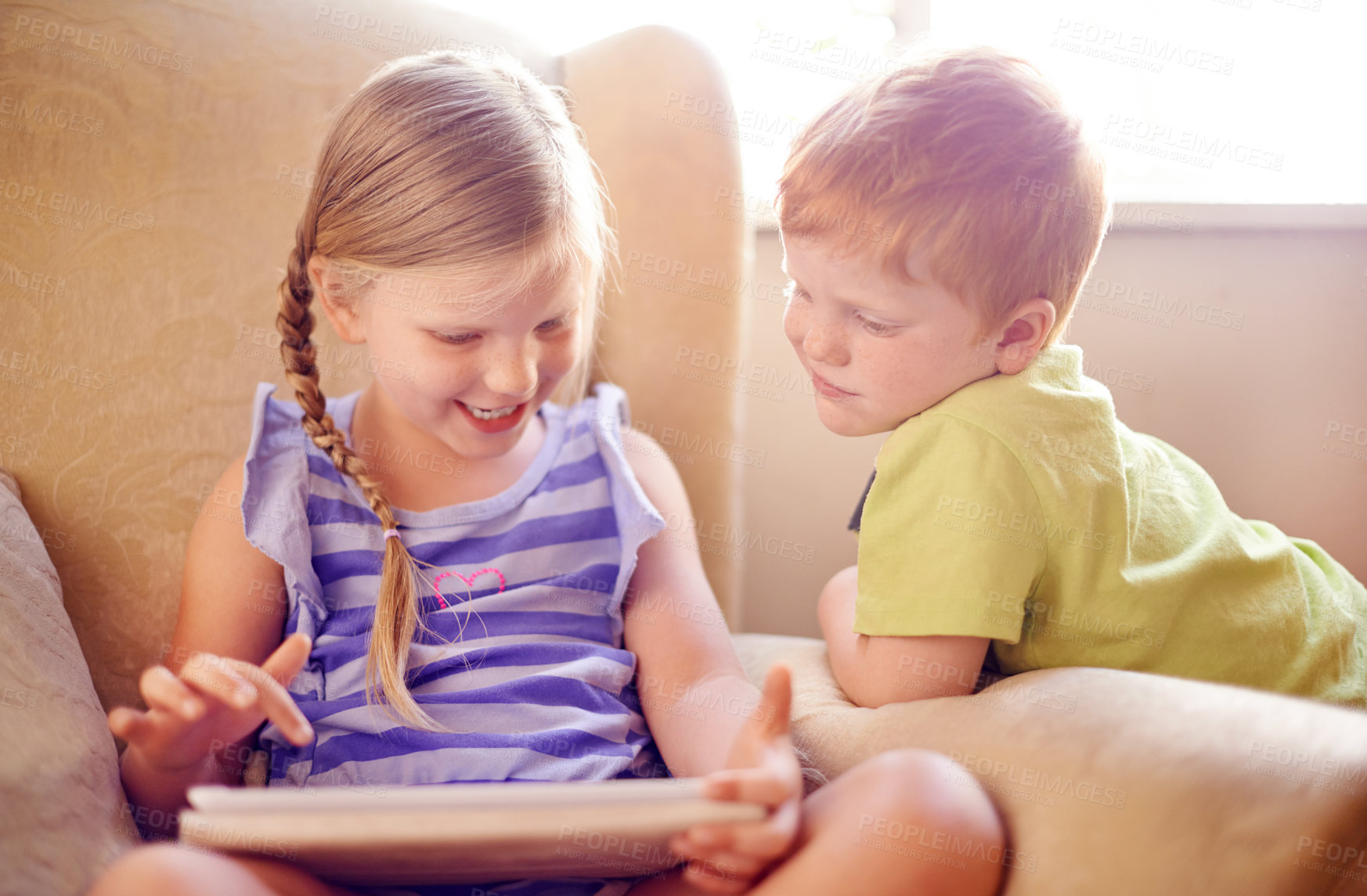 Buy stock photo Relax, family and children with tablet, couch and smile for conversation in home, love or siblings. House, brother and online with sister in lounge, boy and girl with tech for movies or streaming