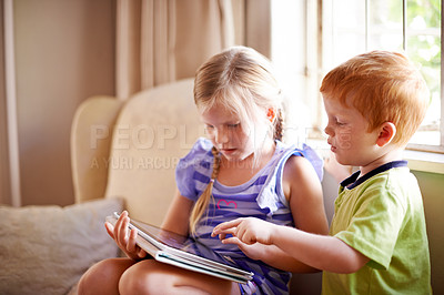 Buy stock photo Tablet, playing and kids on sofa in home with educational online game for learning together. Happy, siblings and children on digital technology watching movie on streaming app in living room in house