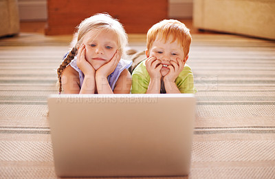 Buy stock photo Learning, siblings and children with laptop, floor and watching of educational videos, home and relax. House, sister and brother with knowledge in living room, growth and development for youth